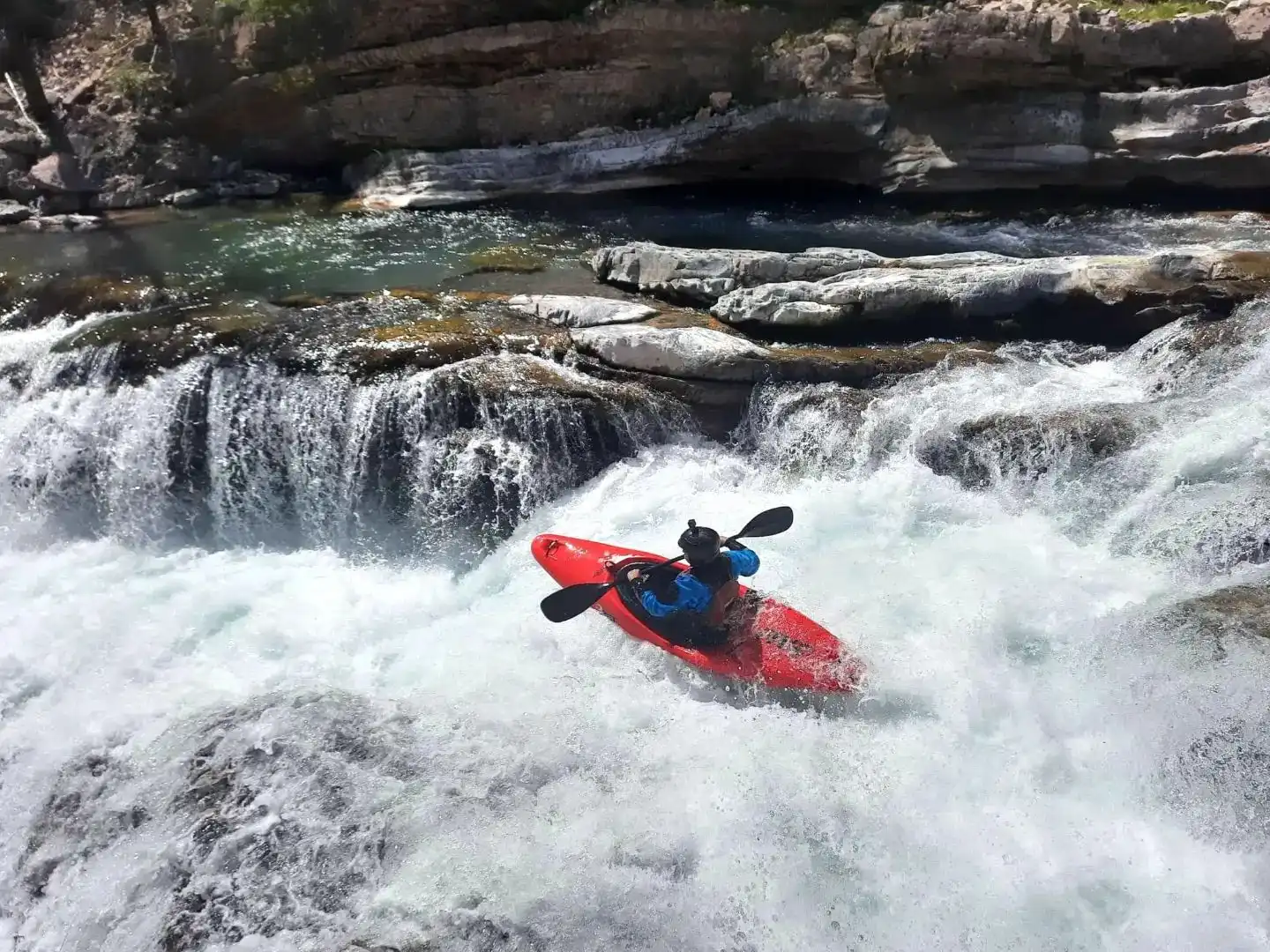 kayaker on white-water river